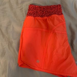 Orange lululemon shorts